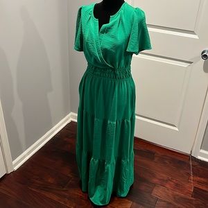 Falls to mid calf length on me. 5' 7"